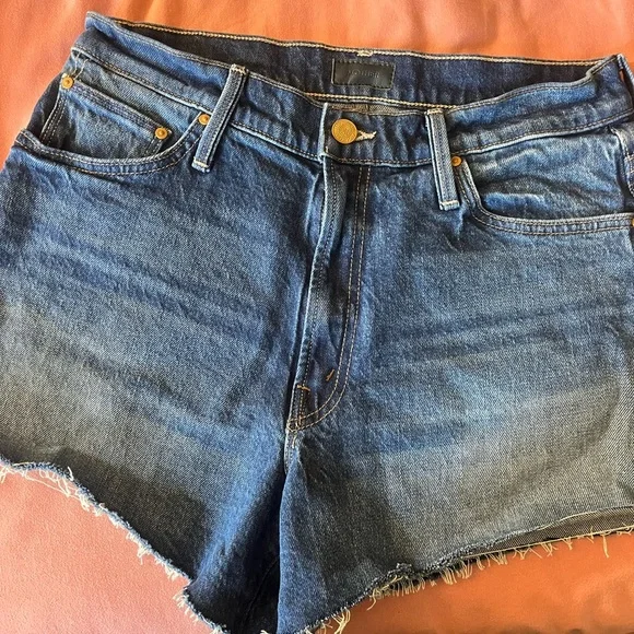 MOTHER Blue Jean Shorts with Distressed Hem and Graphic Text